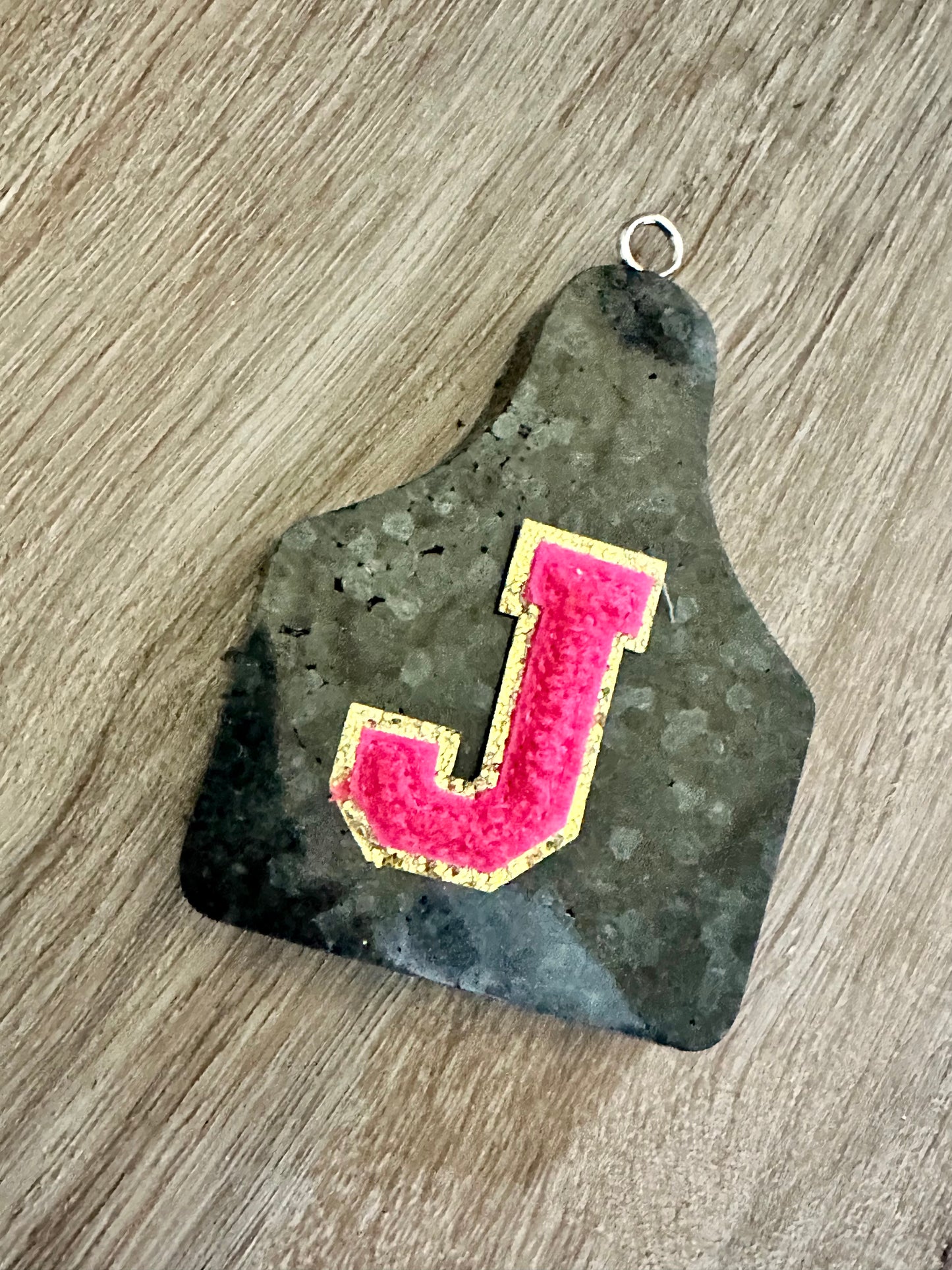 Black ear tag freshie with hot pink Chenille letter